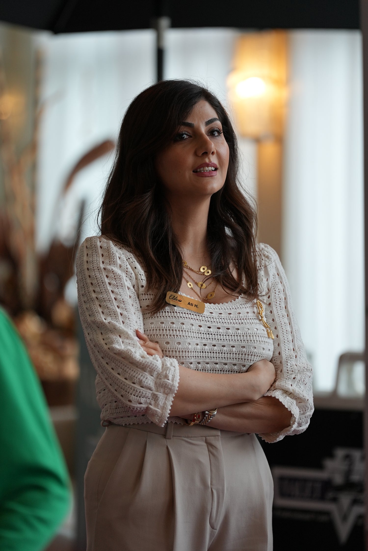 Dr. Atefeh Hadad, founder of Elite Med Spa, standing confidently at the clinic